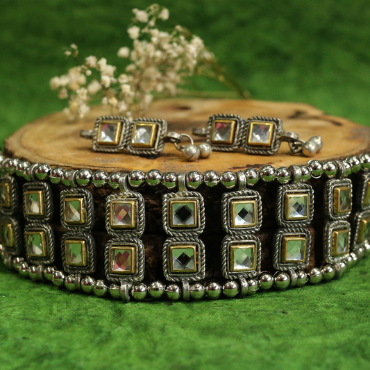 Raha oxidised kundan set
